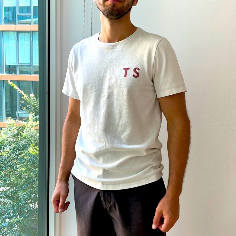 White Color Heavy bag Tee. Used condition
